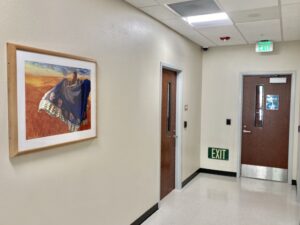 Peterson Picture Co.'s frames are always designed with attention to detail to fit in any space they are designed for - such as this government building corridor.